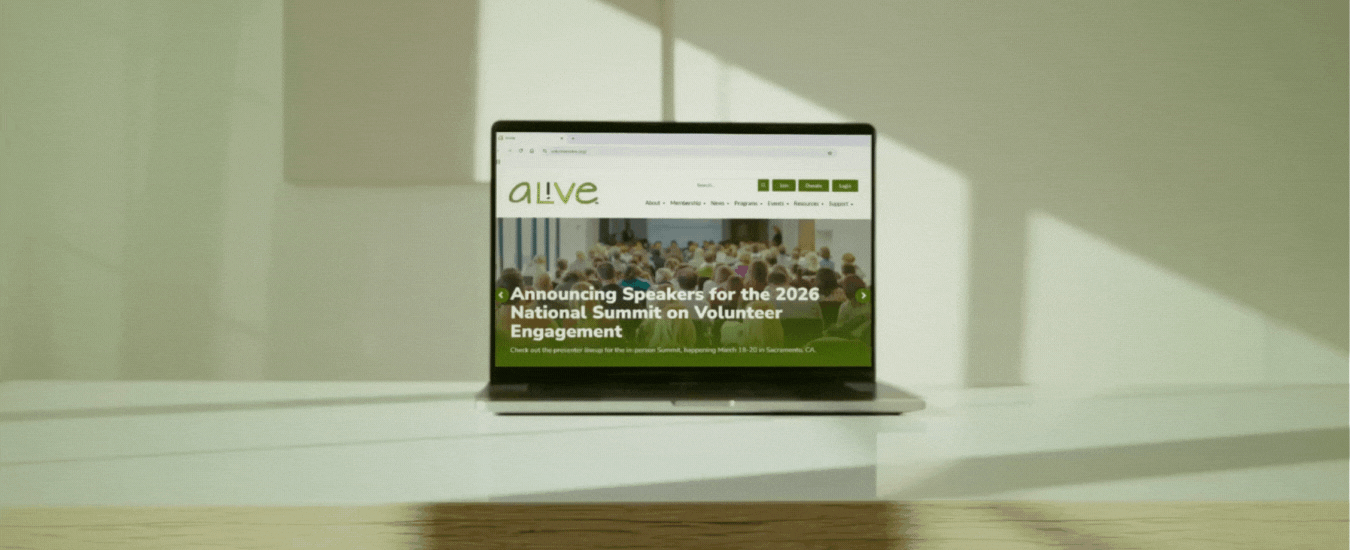 A laptop showing the Alive website